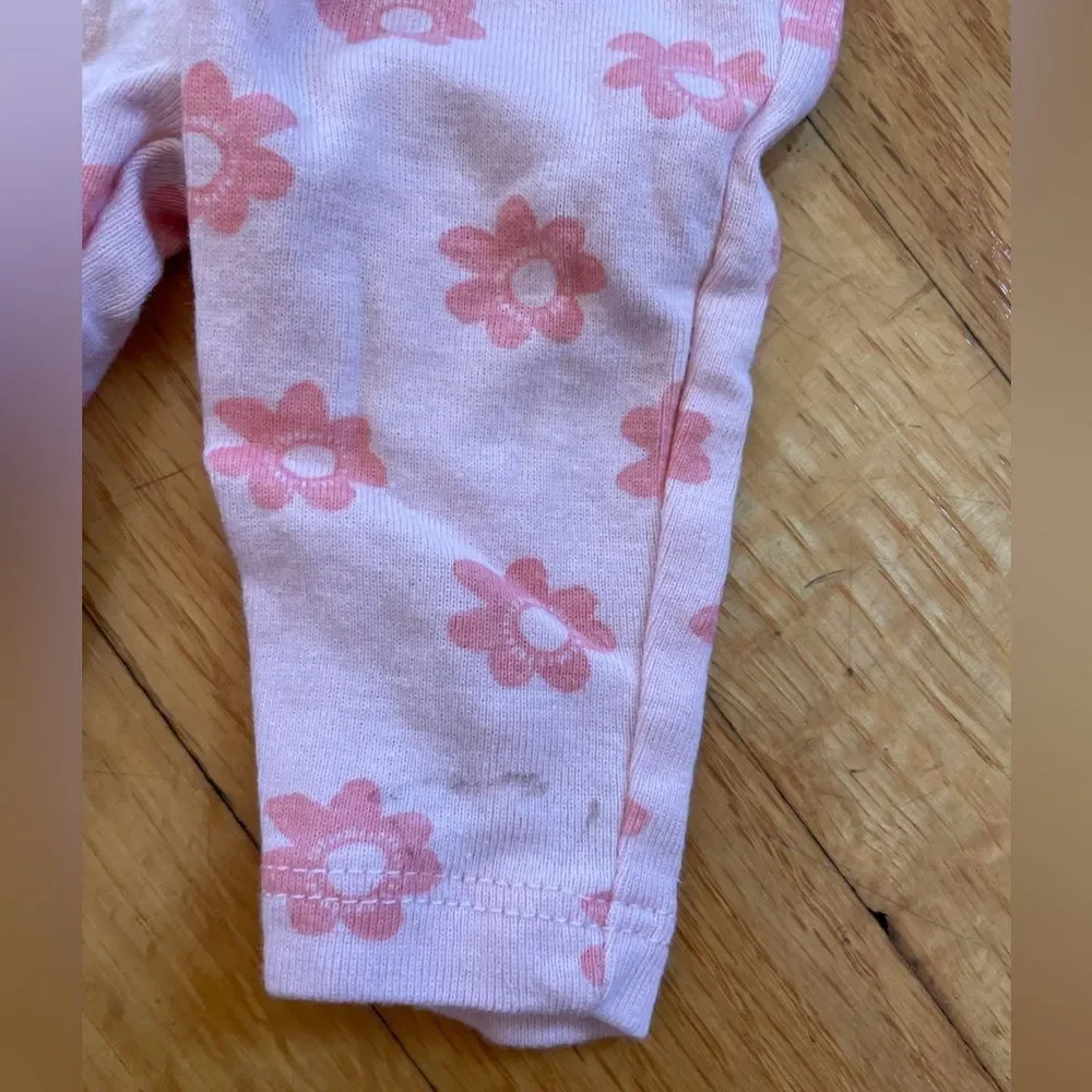 Newborn outfits one is carters one is cat and jack
